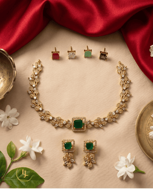 Top-down view of Landmark Jewels floral AD stone choker set with four additional interchangeable colored gemstones on a beige background.