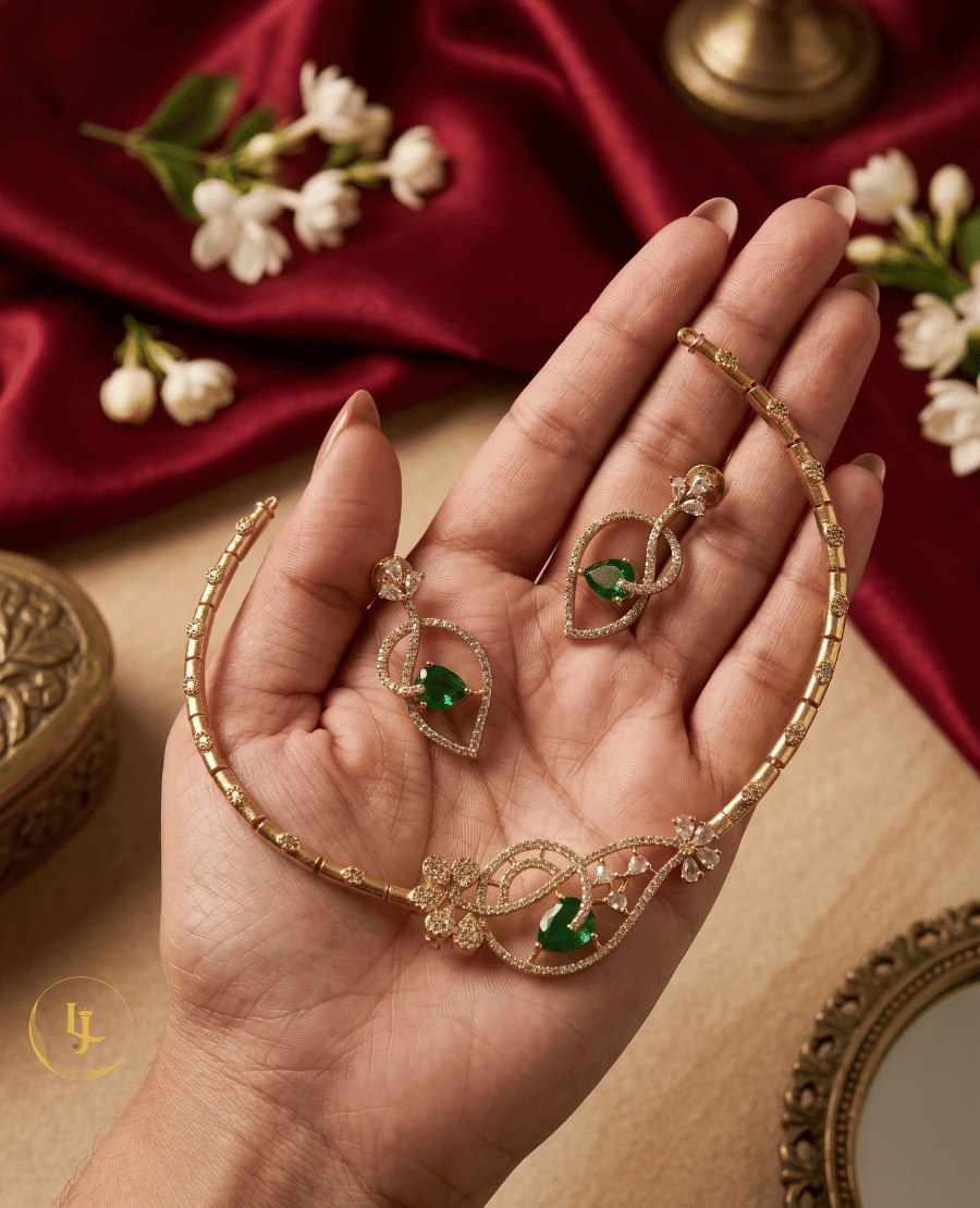 close-up-of-landmark-jewels-emerald-and-american-diamond-choker-and-earrings-held-in-hand-to-show-scale