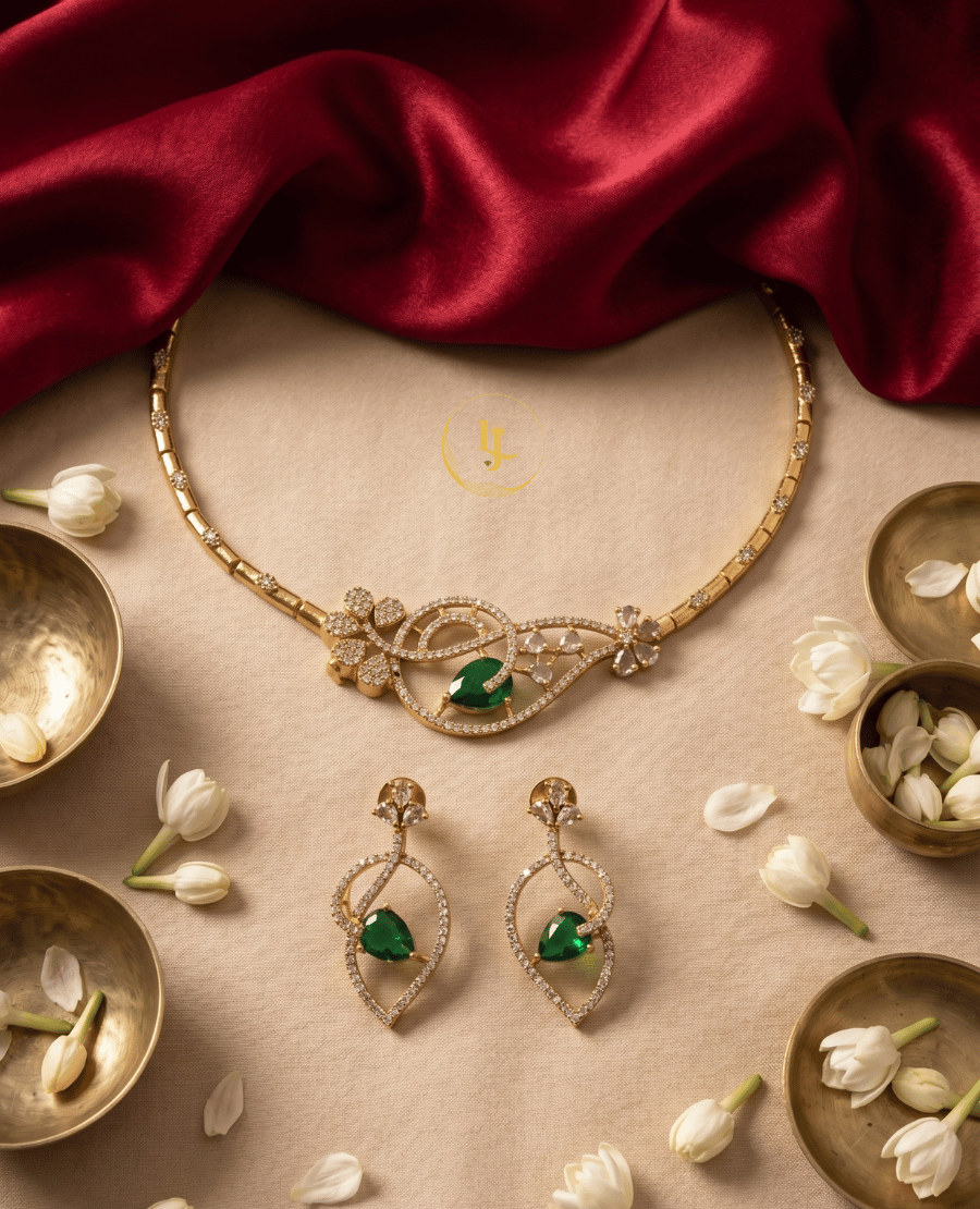luxury-flat-lay-of-landmark-jewels-emerald-necklace-set-with-white-jasmine-flowers-and-red-silk-background