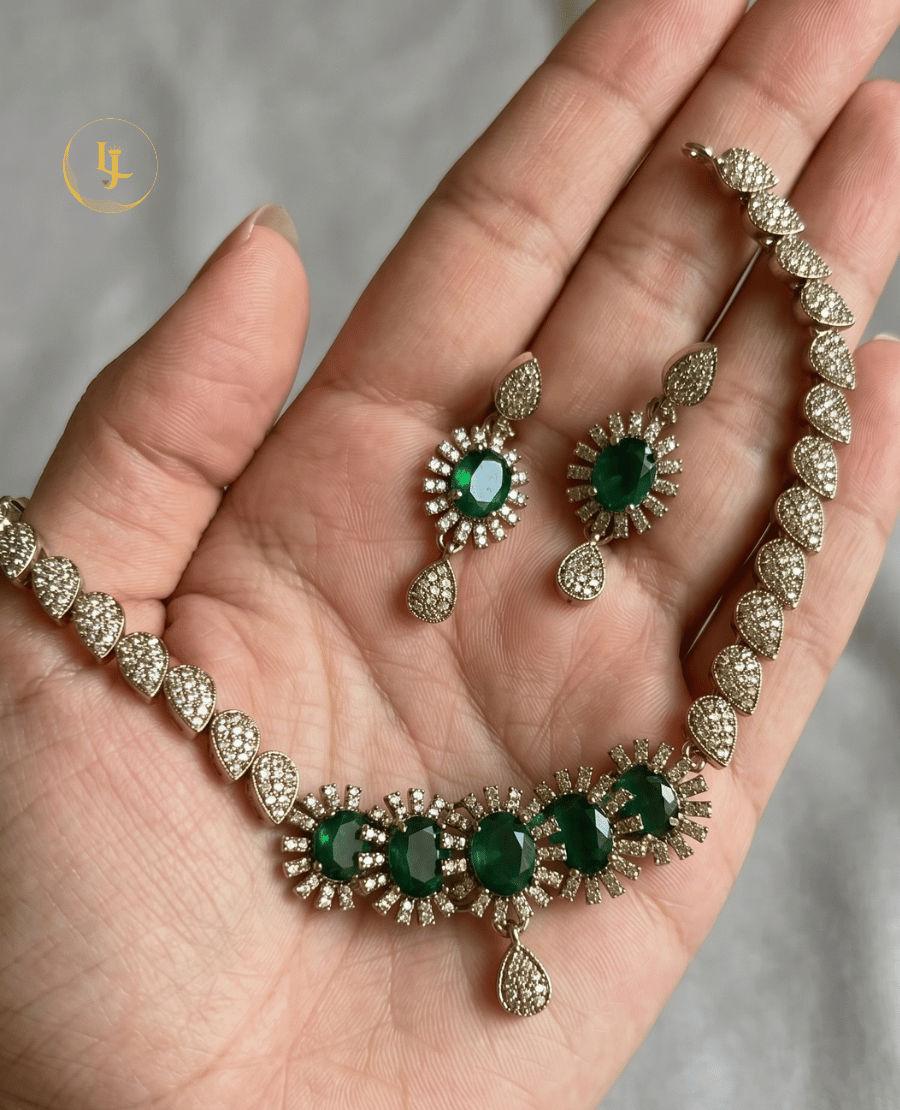 landmark-jewels-green-emerald-and-silver-plated-diamond-choker-set-held-in-hand-to-show-scale-and-craftsmanship