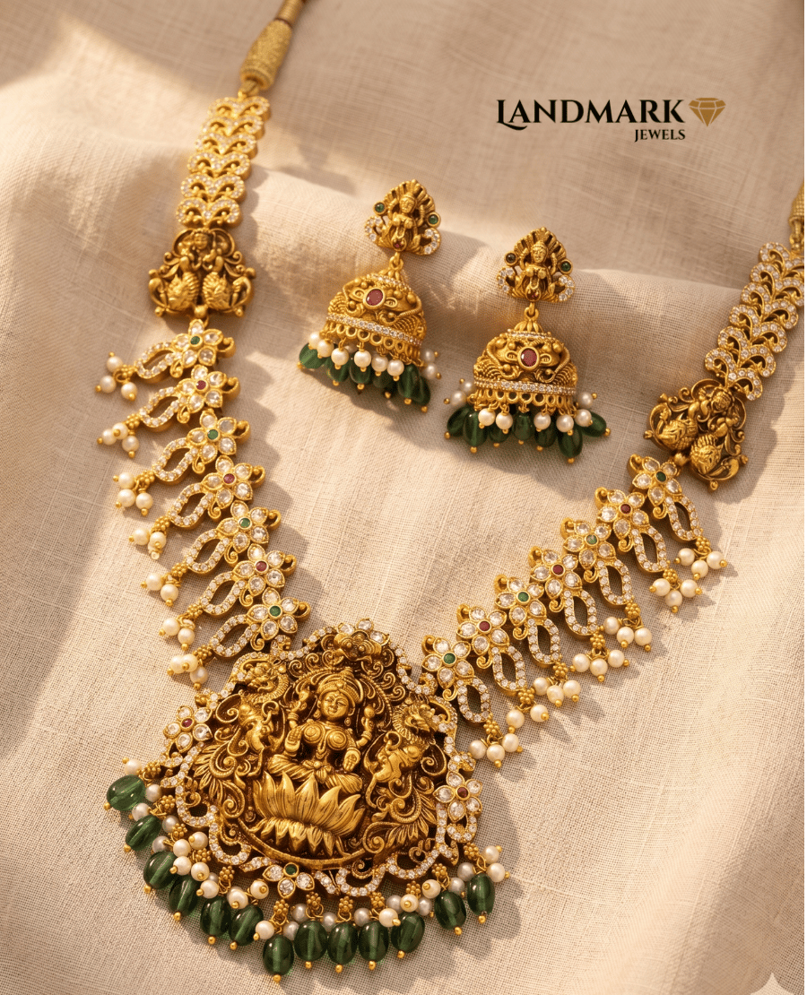 landmark-jewels-antique-gold-plated-temple-necklace-set-featuring-a-goddess-lakshmi-pendant-pearl-drops-and-green-emerald-beads-with-matching-jhumkas