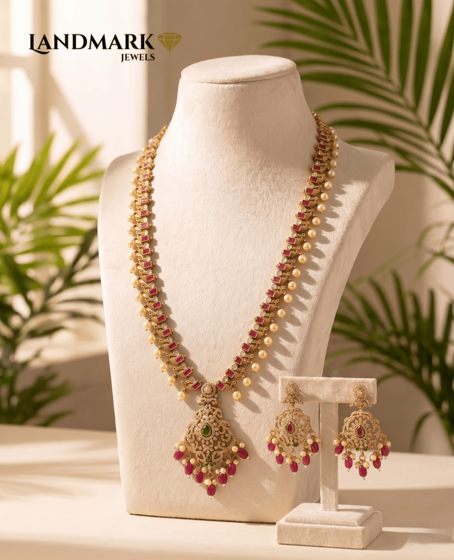 antique-gold-plated-long-haram-necklace-set-with-ruby-stones-pearl-drops
