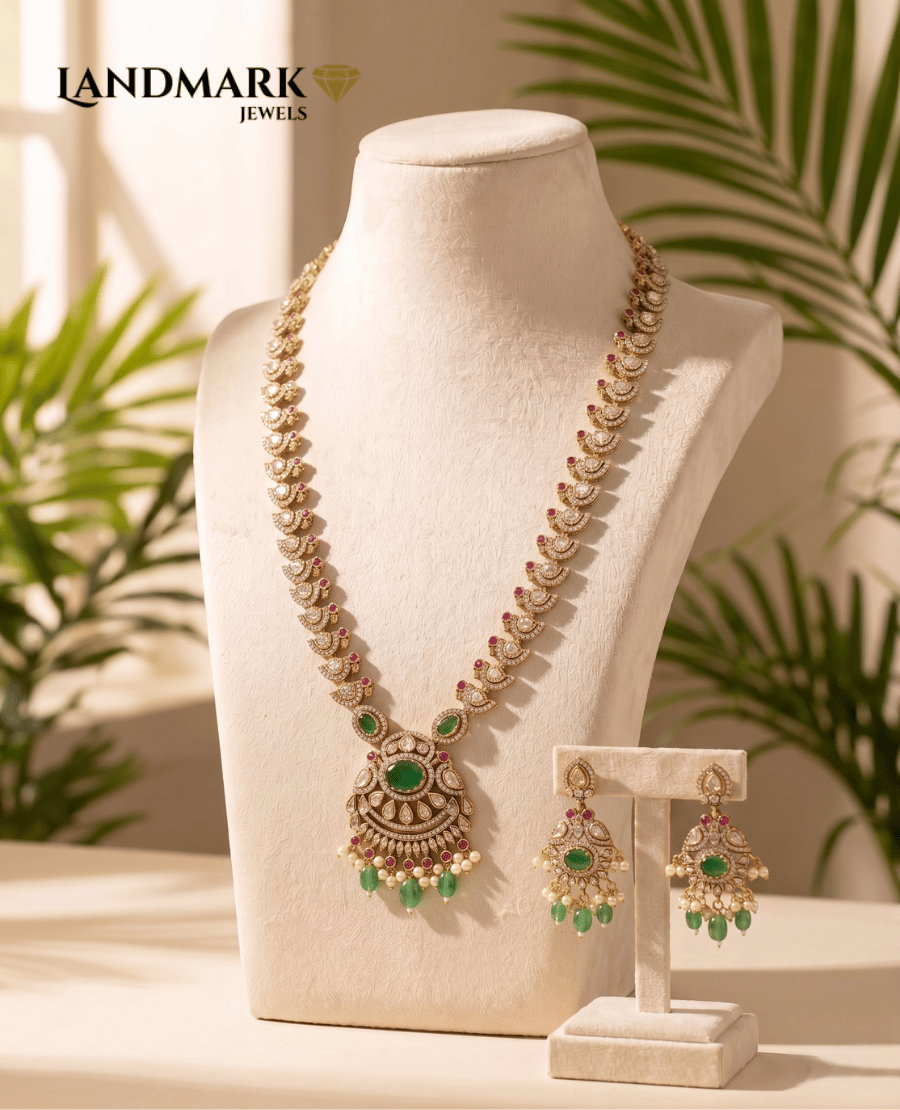 antique-gold-plated-long-polki-haram-necklace-set-with-emerald-green-stones