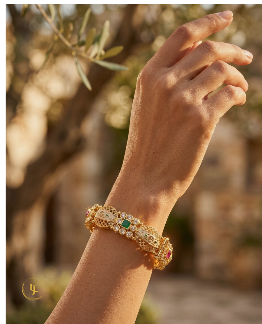 pair-of-gold-plated-indian-kada-bangles-with-mint-green-and-pink-stones-and-white-enamel-meenakari-work-on-a-silk-background