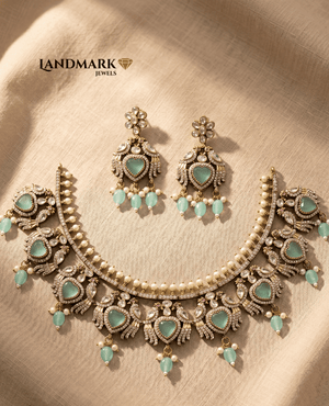 Landmark Jewels Sea-Green Heart Shaped Kundan Necklace and Earring Set with Pearl Drops.