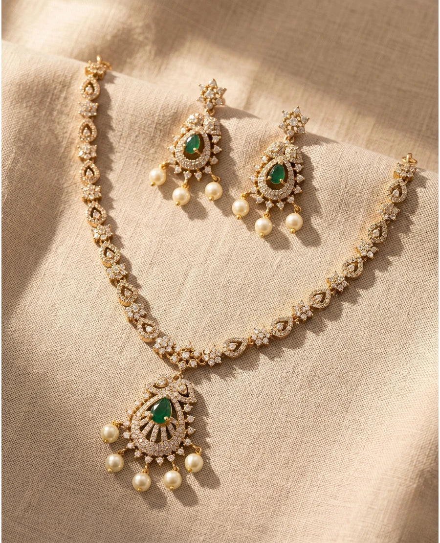 gold-plated-emerald-green-american-diamond-temple-necklace-set-with-pearl-drop-pendant-and-earrings