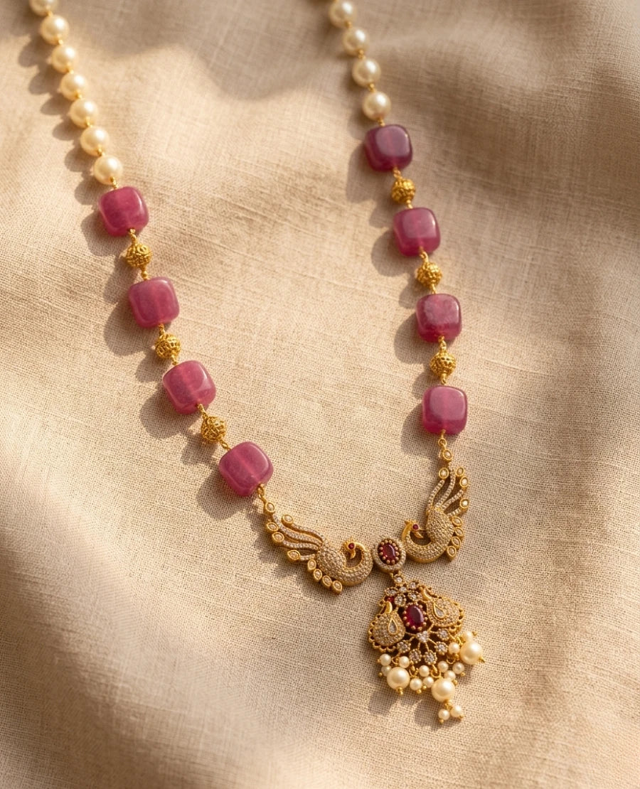 gold-plated-pink-quartz-and-pearl-beaded-necklace-with-peacock-temple-pendant
