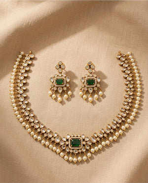 Emerald green kundan pearl gold plated traditional choker necklace set with matching earrings
