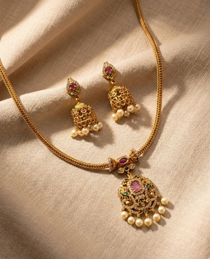 Temple pink stone pearl gold plated pendant necklace with traditional jhumka earrings