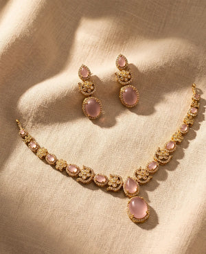 Gold plated necklace with pink rose quartz stones and American diamonds with matching pink stone earrings