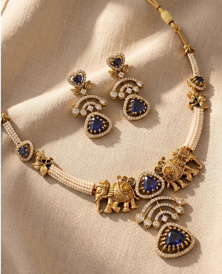 antique-gold-temple-necklace-with-elephant-motifs-blue-stones-and-pearls-with-matching-earrings