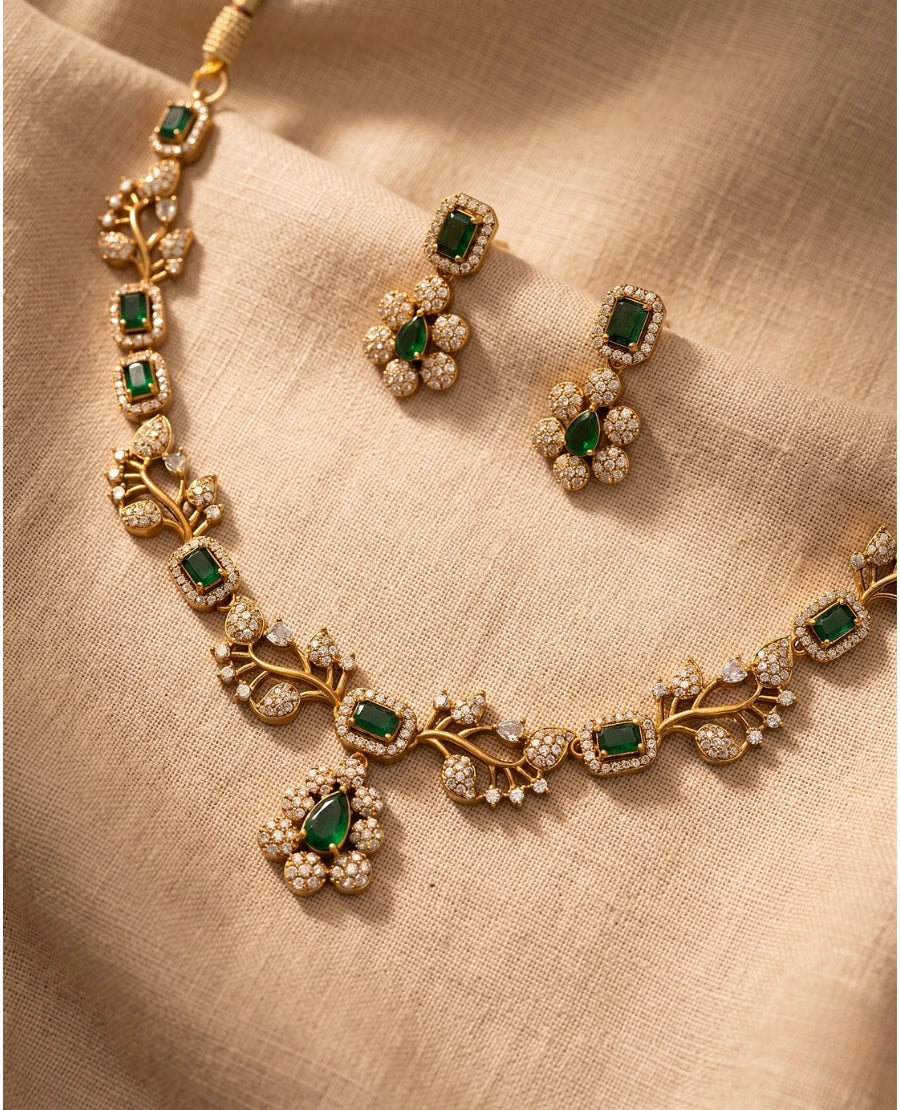 gold-plated-emerald-green-necklace-set-with-leaf-vine-design-cz-diamonds-and-matching-floral-drop-earrings