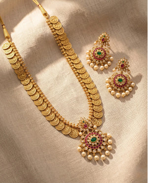 Long antique gold Kasu coin haar necklace set with ruby emerald pendant and pearl drop jhumka earrings