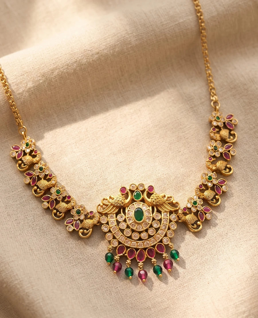 traditional-south-indian-temple-gold-necklace-with-peacock-design-emerald-ruby-stones-and-cz-diamonds