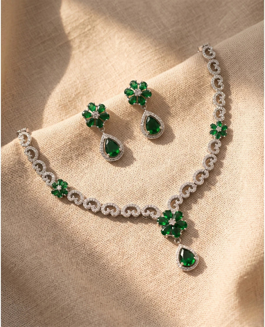 silver-rhodium-plated-american-diamond-necklace-set-with-emerald-green-floral-design-and-matching-earrings