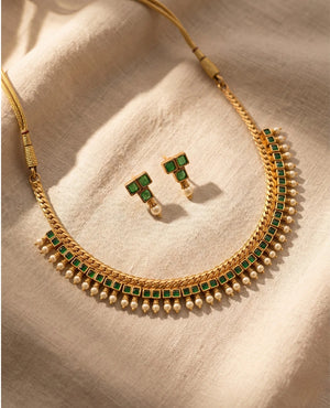 Traditional gold plated choker necklace with emerald green square stones pearl fringe and matching earrings