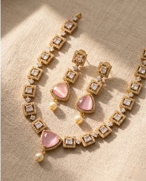 Antique gold necklace with blush pink cat eye stone, square CZ stones and pearl drop earrings