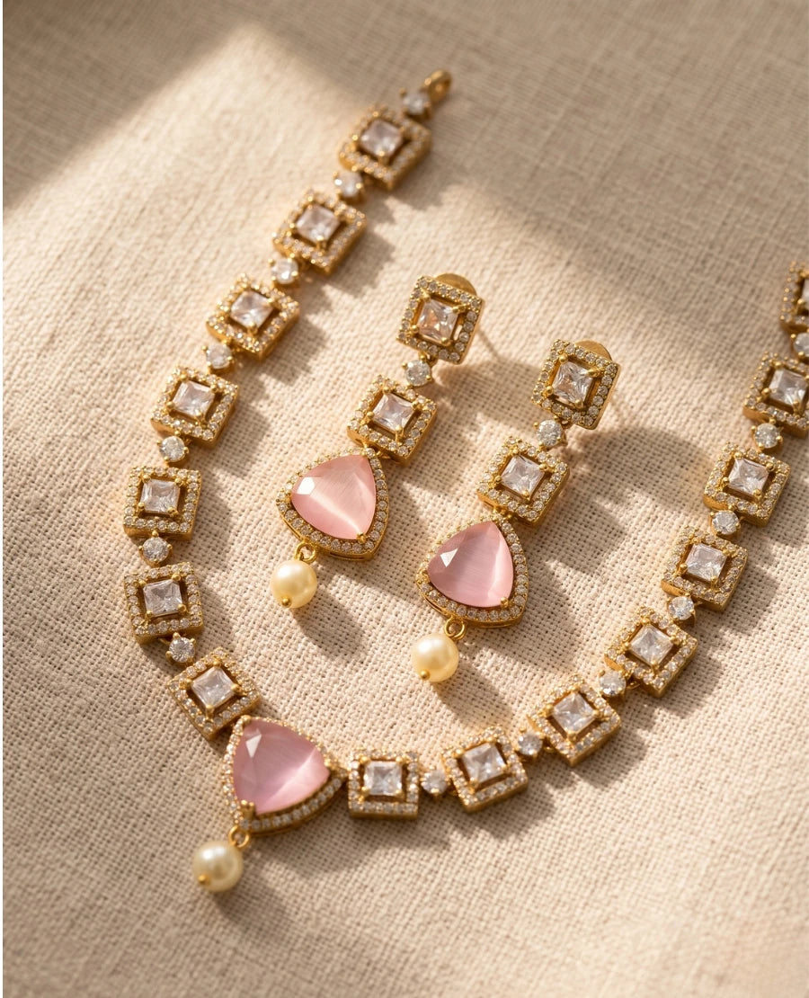 antique-gold-necklace-with-blush-pink-cat-eye-stone-square-cz-stones-and-pearl-drop-earrings
