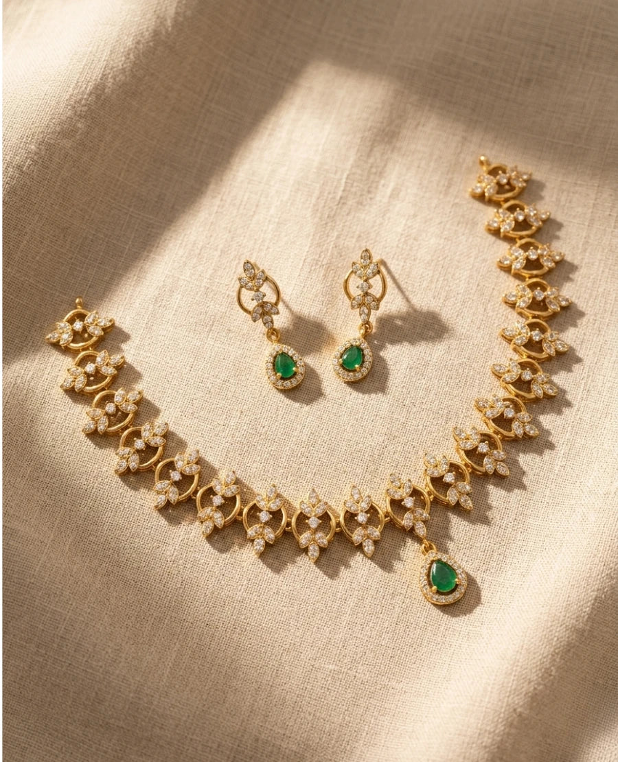 gold-plated-american-diamond-floral-link-choker-necklace-with-emerald-green-pendant-and-earrings