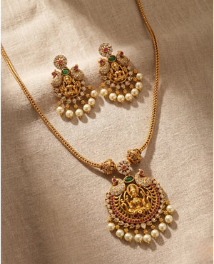 Antique gold Lakshmi temple peacock necklace with pearl fringe and matching earrings