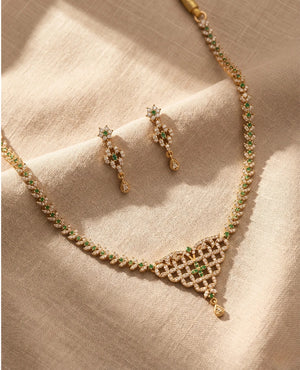 Gold finish emerald green lattice American diamond necklace set with matching drop earrings