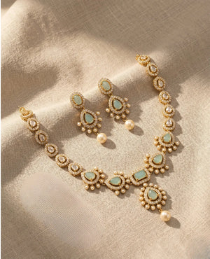 Gold plated pastel mint green American diamond necklace set with pearl drop earrings