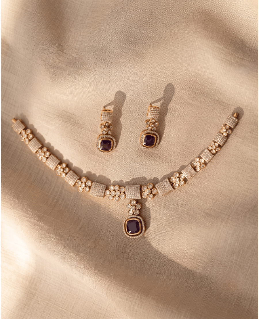 gold-choker-necklace-with-paved-crystal-squares-floral-motifs-and-a-deep-purple-monalisa-stone-pendant-with-matching-earrings