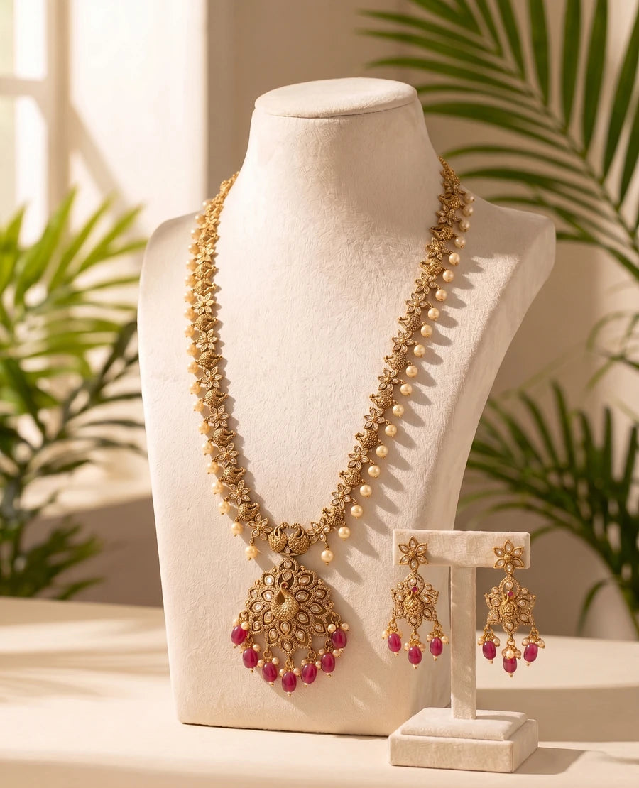 antique-gold-plated-peacock-long-haram-set-with-ruby-beads